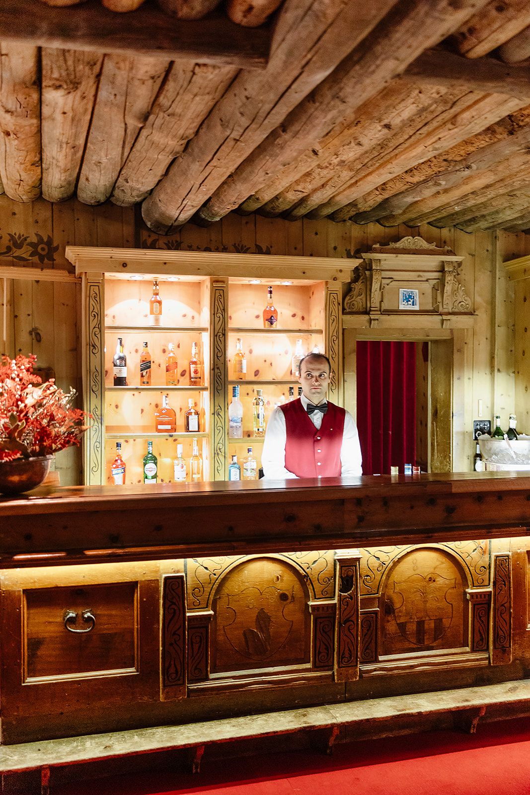 Bar counter at the rehearsal dinner of old world winter wedding in Saint Moritz