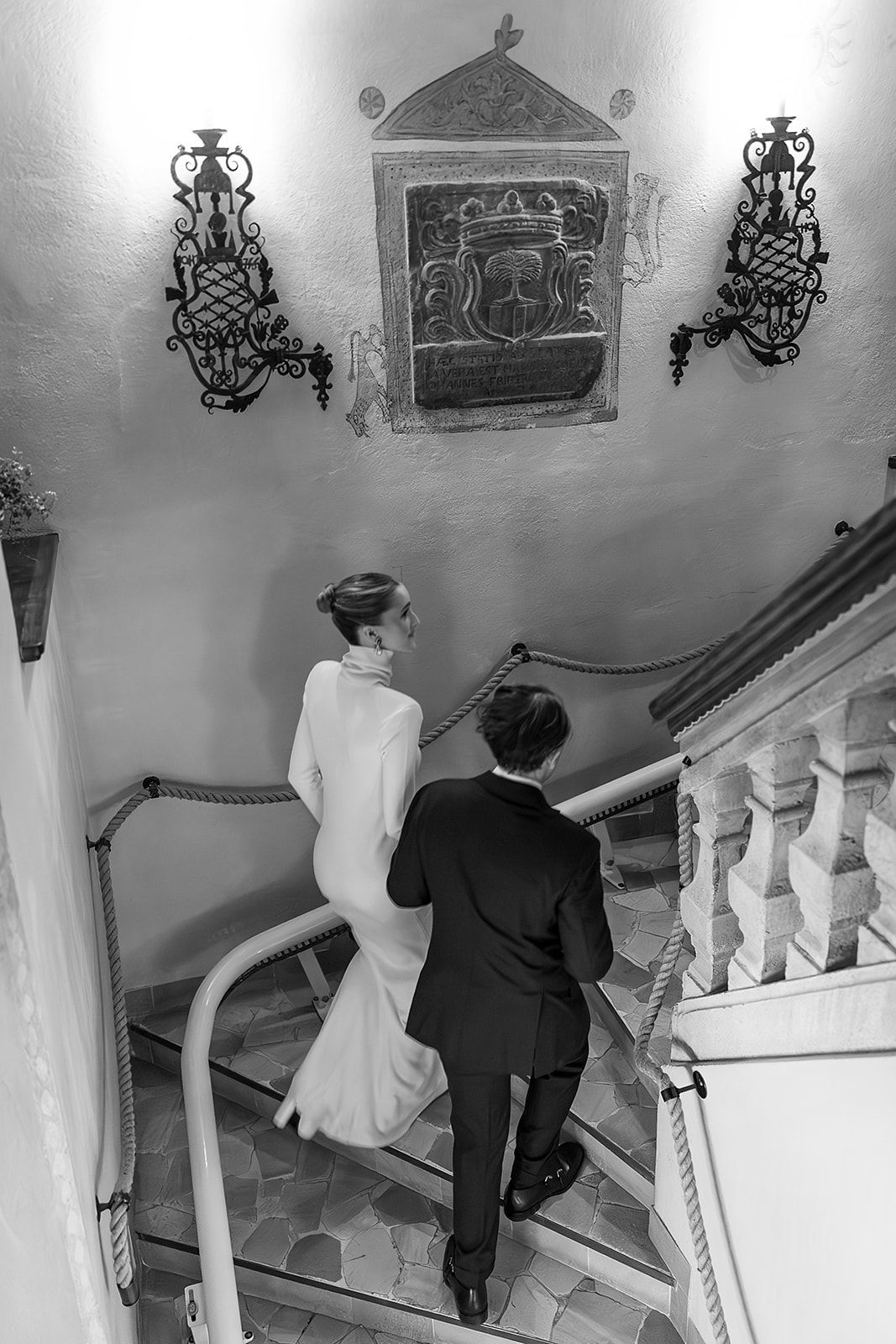 Bride and groom arrival at the rehearsal dinner of old world winter wedding in Saint Moritz