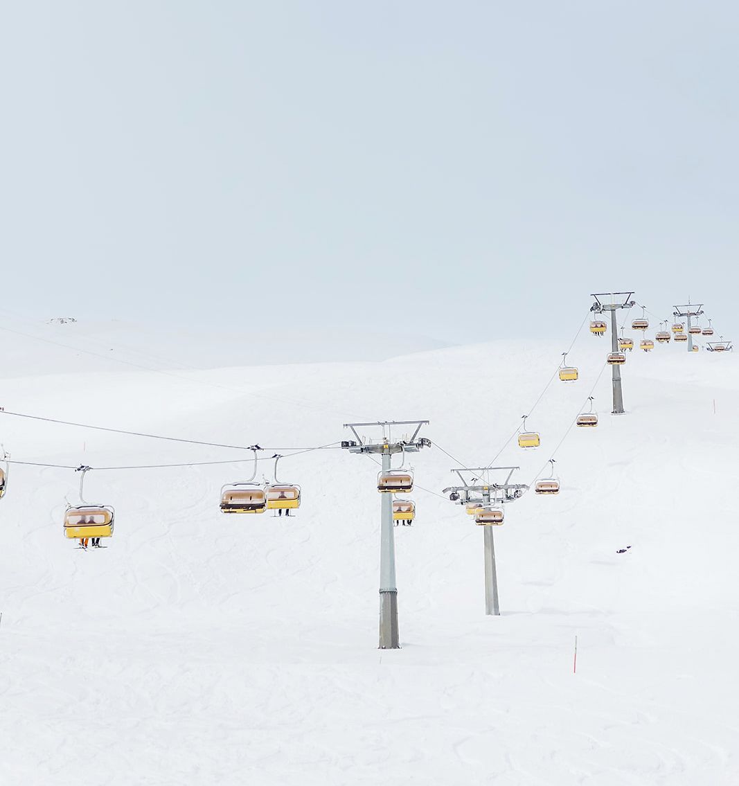 Chairlift to the welcome dinner of old world winter wedding in Saint Moritz