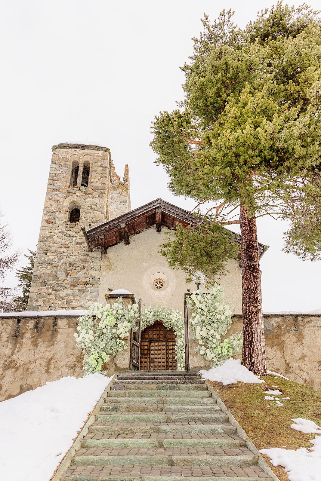 Church at the old world winter wedding in Saint Moritz