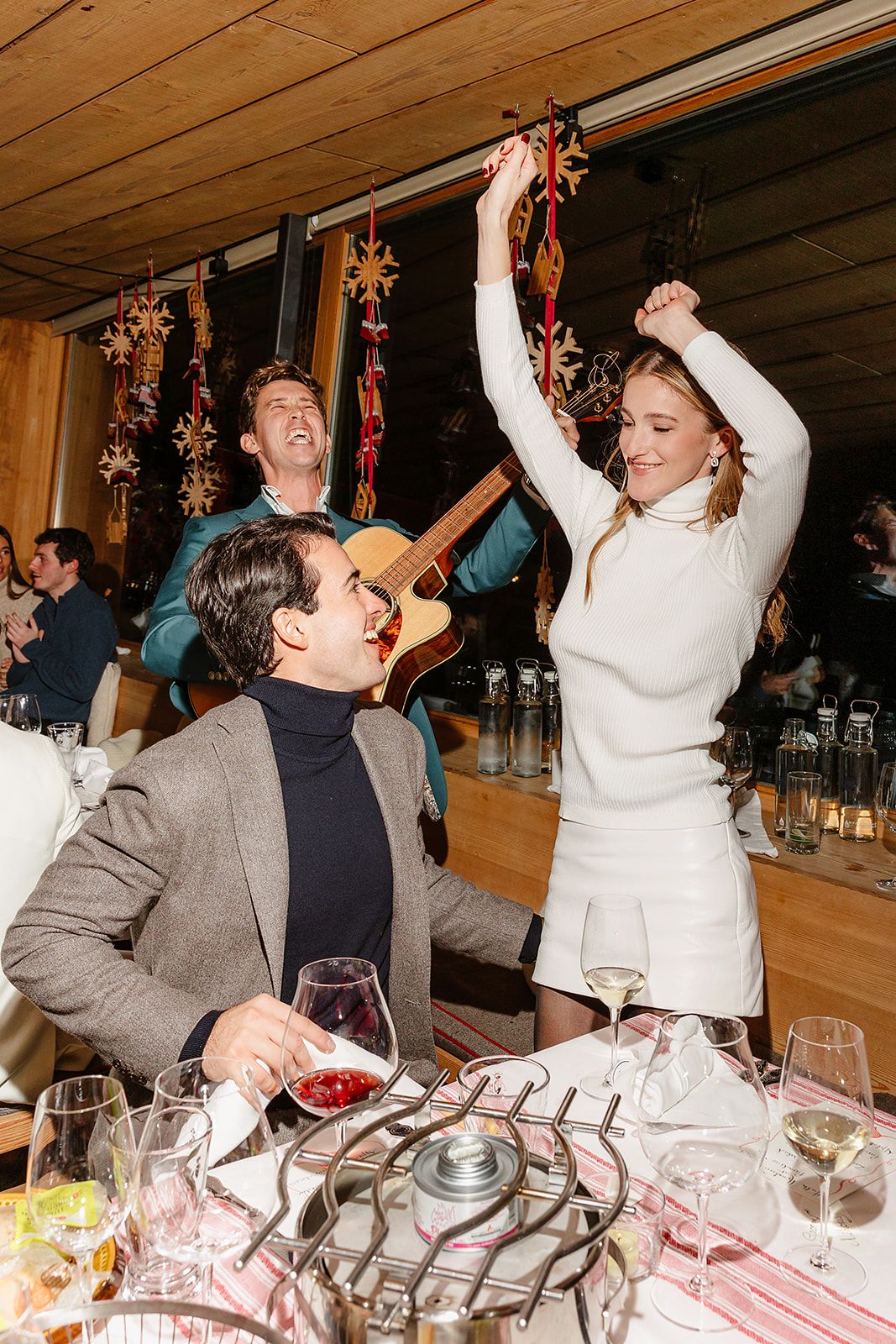 Dancing bride at the welcome dinner of old world winter wedding in Saint Moritz