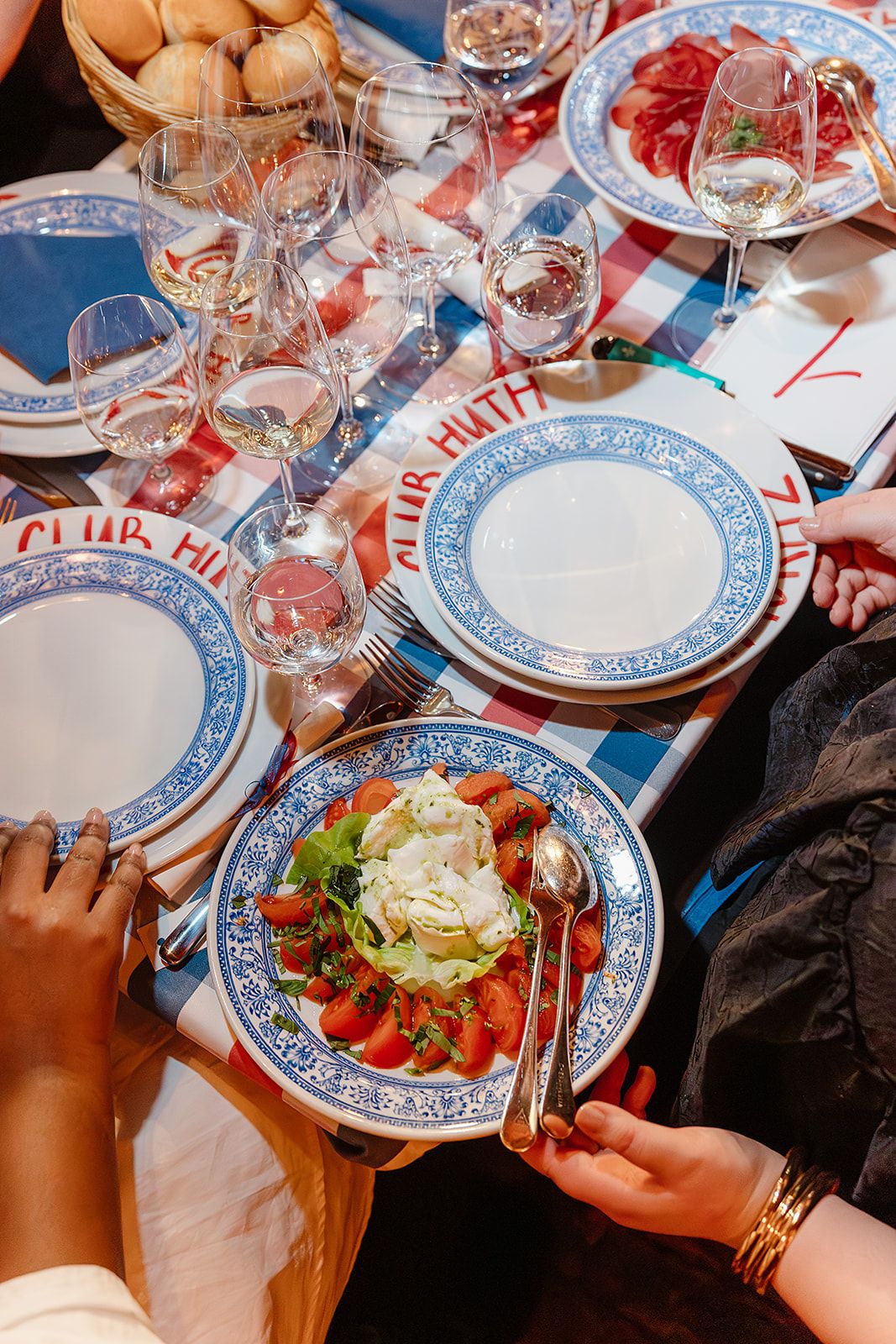 Salad at the rehearsal dinner of old world winter wedding in Saint Moritz