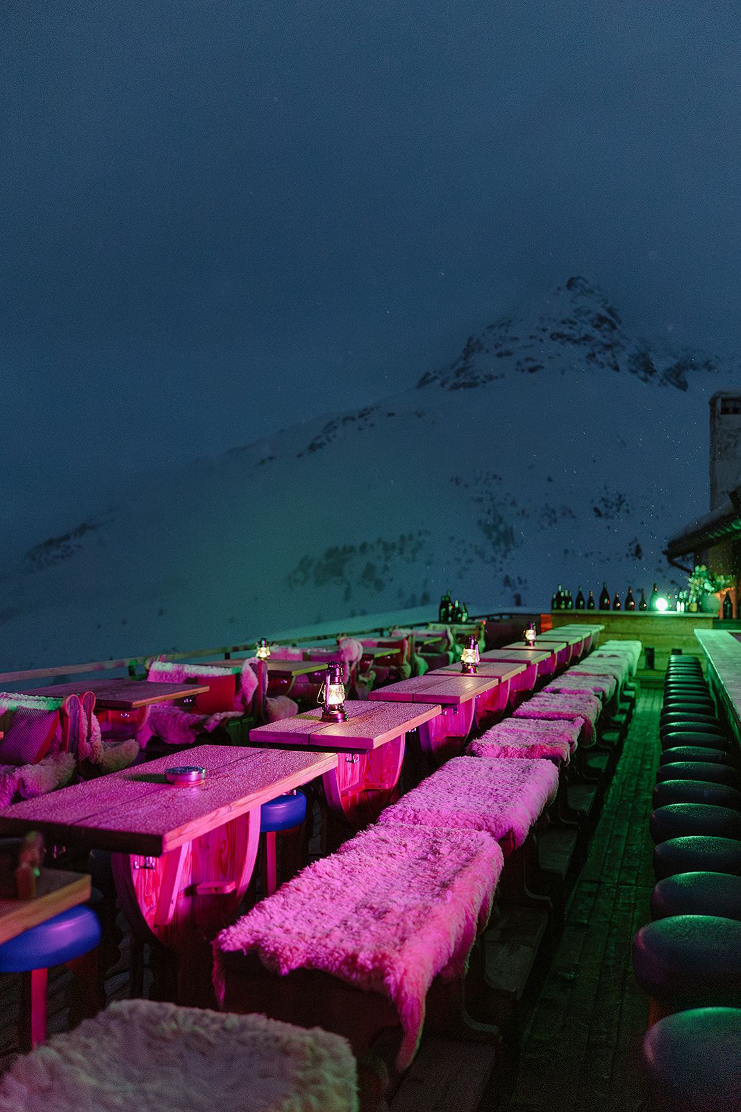 View of the outdoor relax area at the welcome dinner of old world winter wedding in Saint Moritz